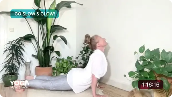 Viveka demonstrates a yoga pose, embodying tranquility and balance in the serene setting.